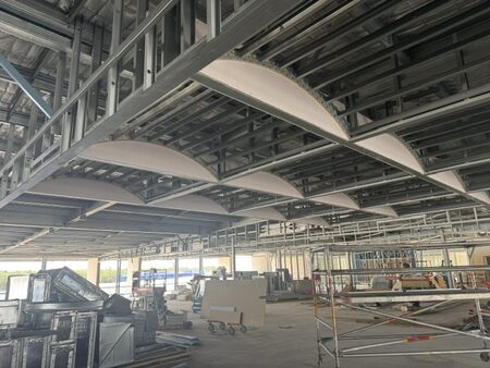 Commercial ceiling plasterboard fit-out with curved bulkheads